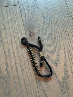 Shashi Black and Gold Braided Adjustable Bracelet